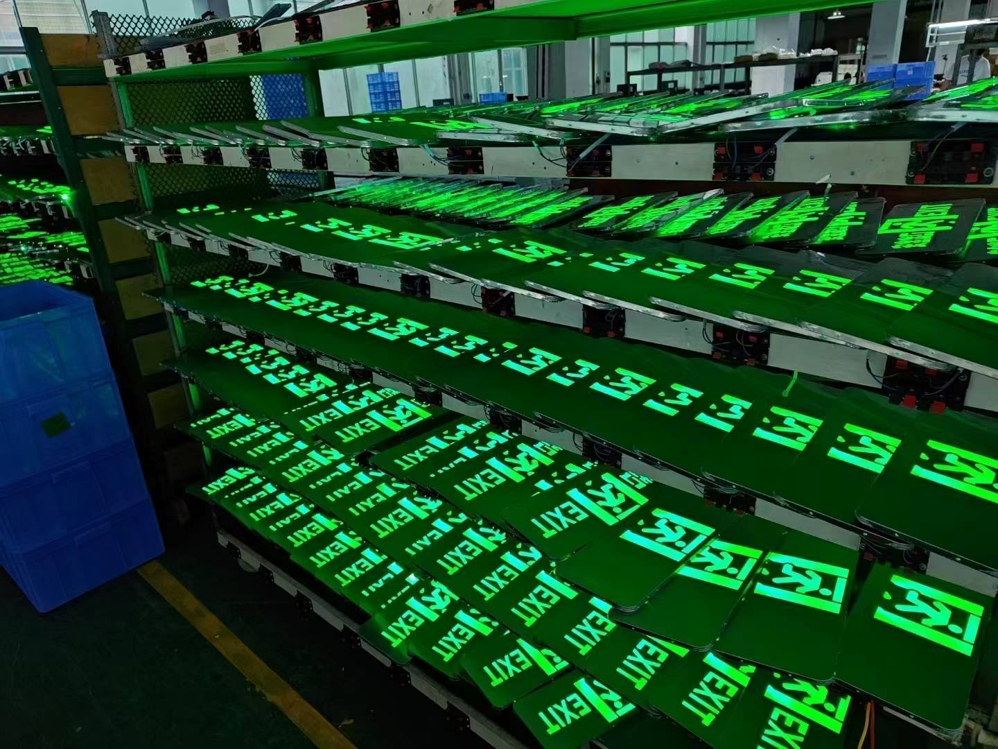 Ageing and illumination test racks for exit signs