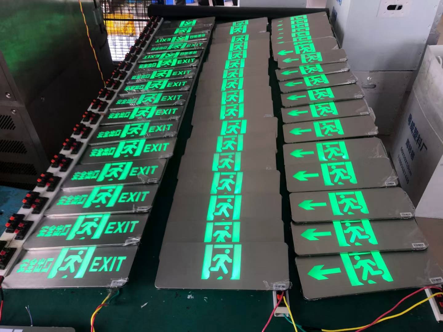 Batch illumination testing of exit signs